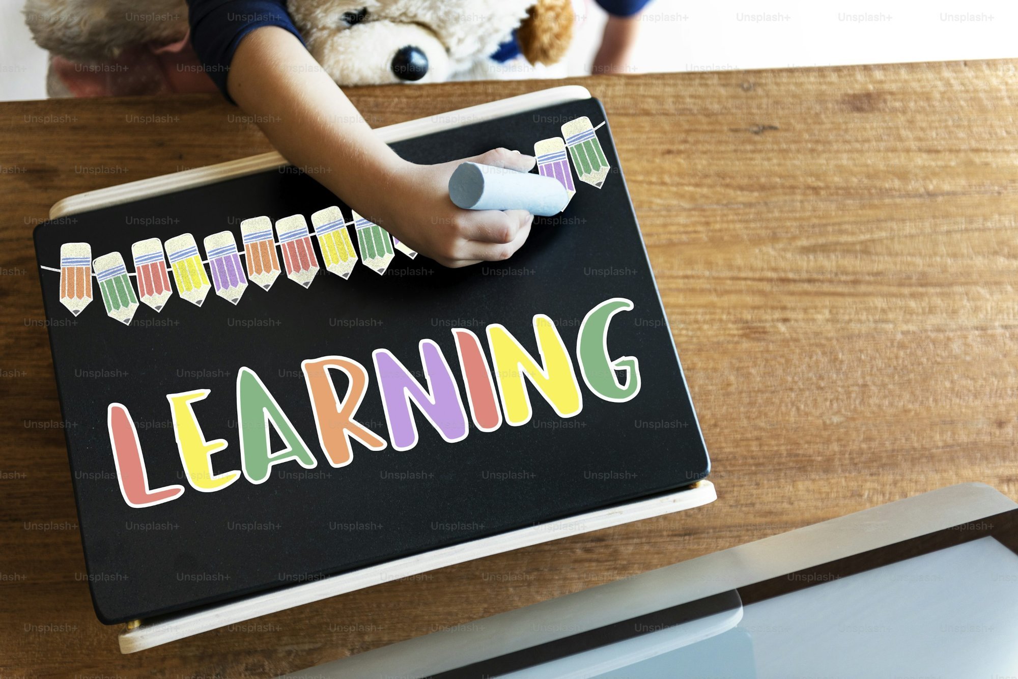 Child learning at chalkboard